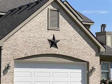 what do the large metal stars on houses mean|star on house meaning swinging.